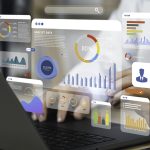 An analyst uses a computer and dashboard for data business analysis and Data Management System with KPI and metrics connected to the database for technology finance, operations, sales, marketing